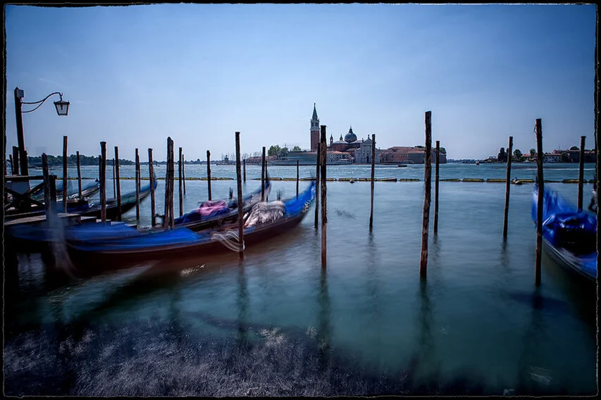 Long exposure color and black & white photograph of Venice, Italy’s canals and architecture during the day and night