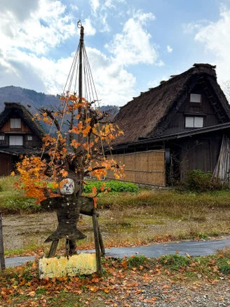 Panorama of Shirakawa-Go village and valley forest in autumn foliage